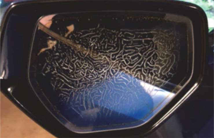 Damaged-C8-Chevrolet-Corvette-driver-side-rear-view-mirror-caused-by-radar-detector-installati...jpg