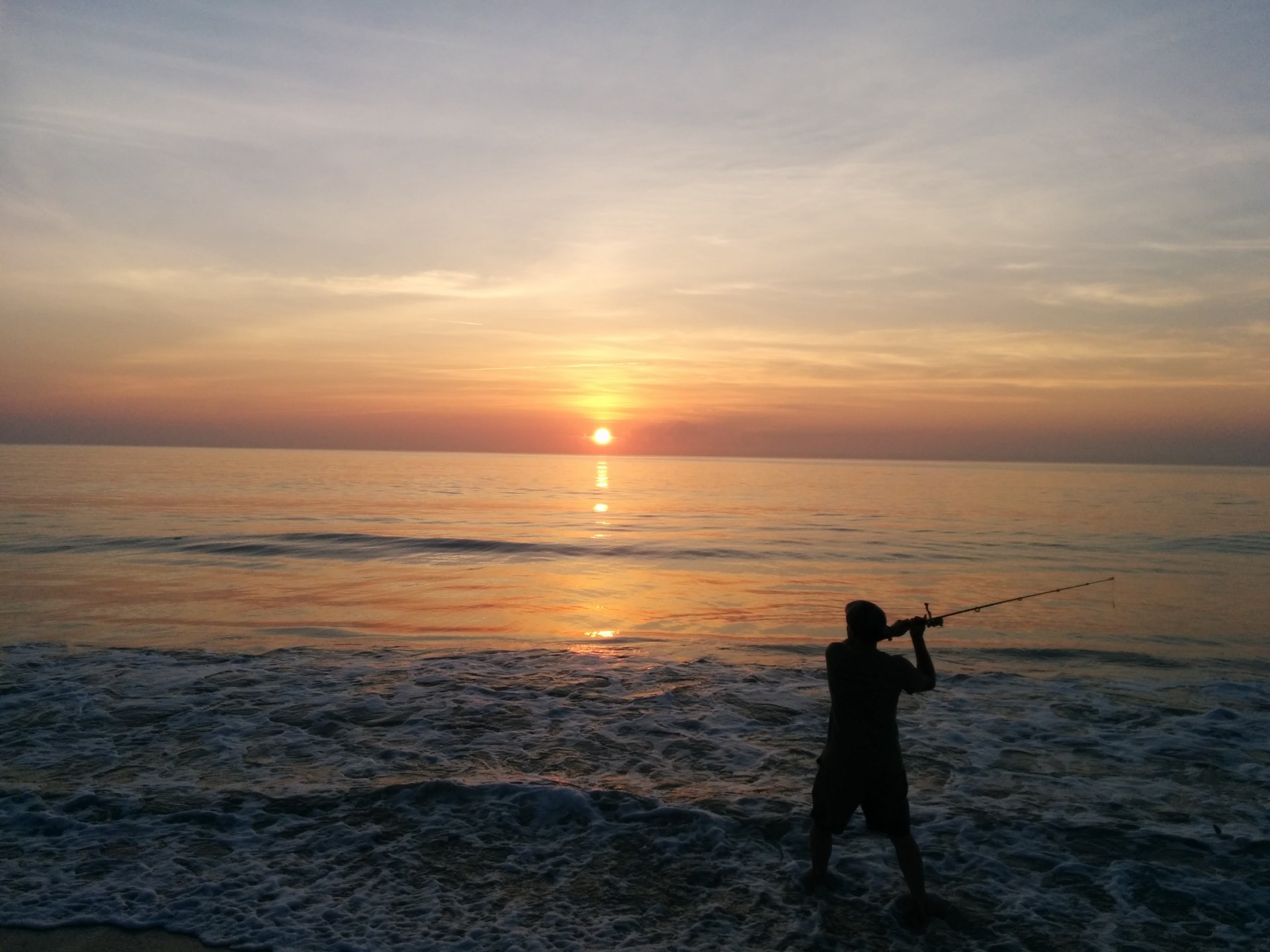 Early morning surf fishing