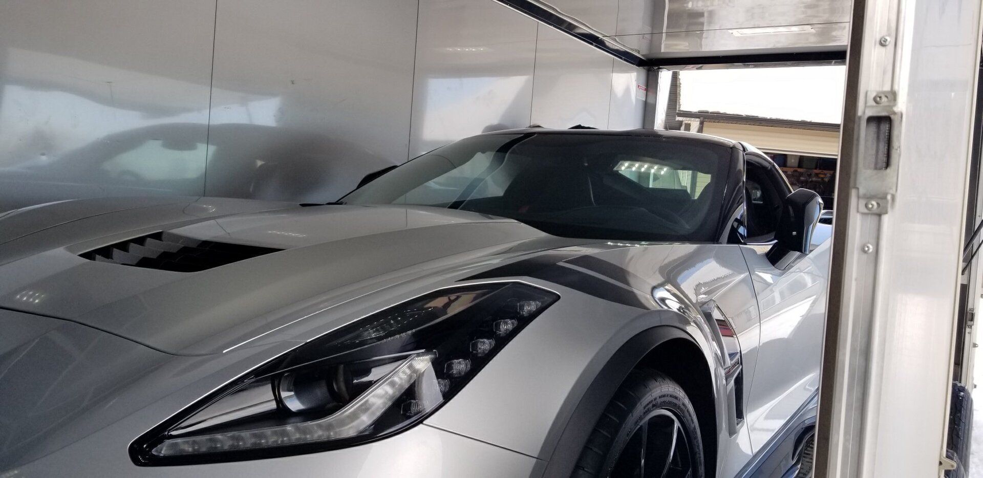 front of Vette in trailer.JPG