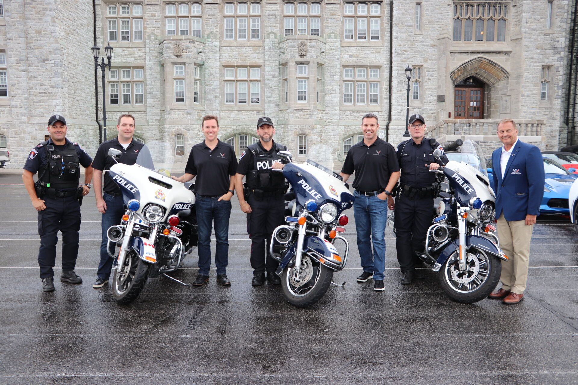 Kingston Police with the President, Vice President and  Marketing manager of GM.JPG